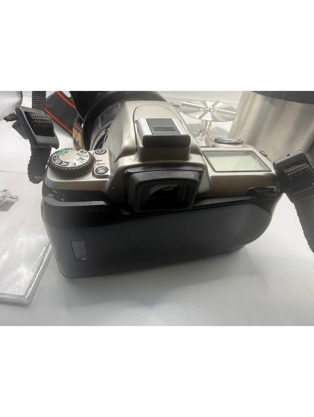 Nikon N65 35-70mm SLR Film Camera with Accessories and Carrying Case